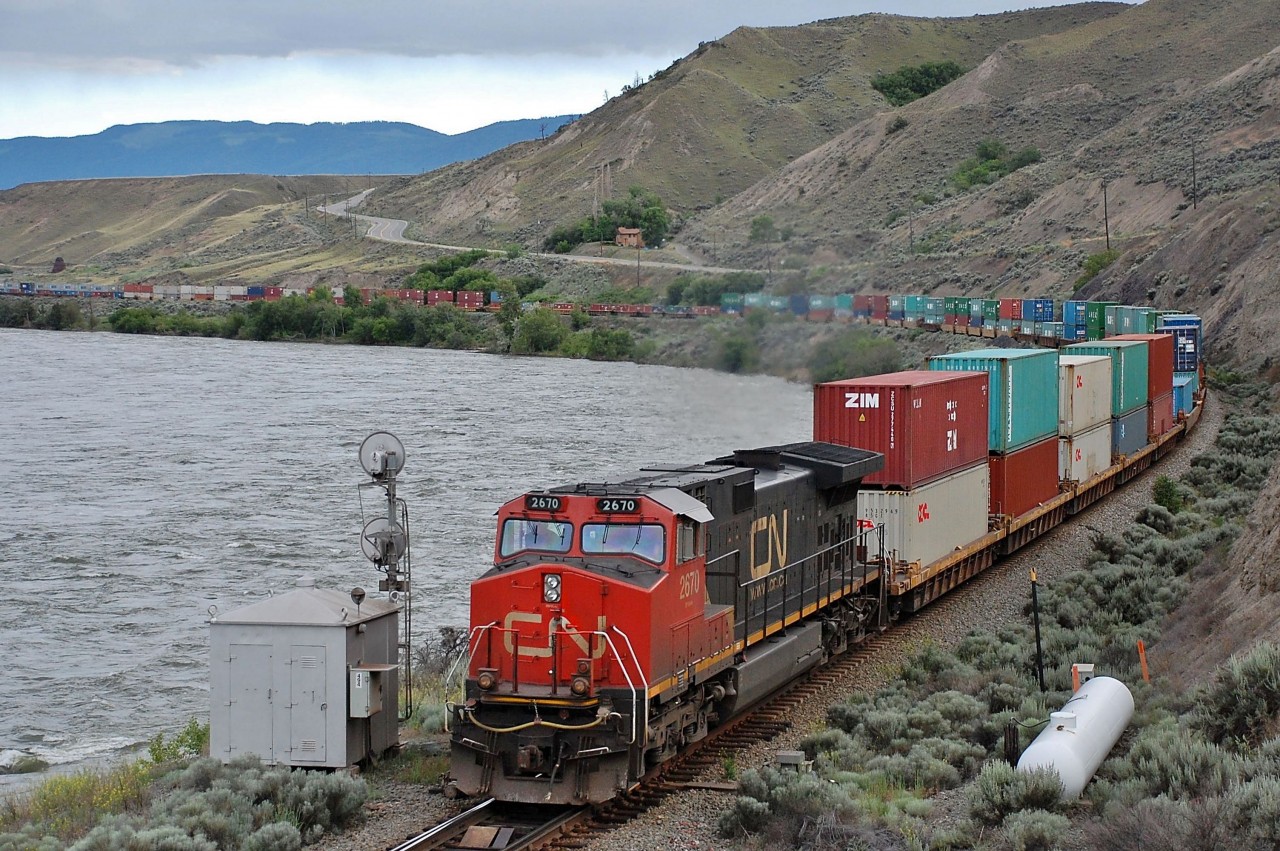 An eastbound Intermodal is coasting into Ashcroft behind CN 2670.