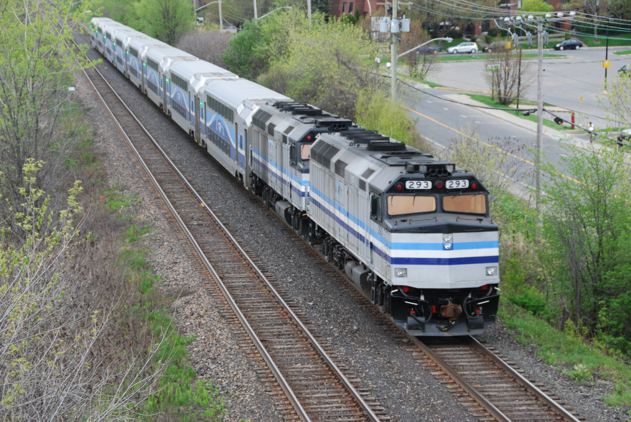 A pair of ex-Amtrak F40PH's shove train 121 away from the Beaconsfield bridge.  These have since left AMT with TANX reporting marks, displaced by more ex-GOT F59PH's.