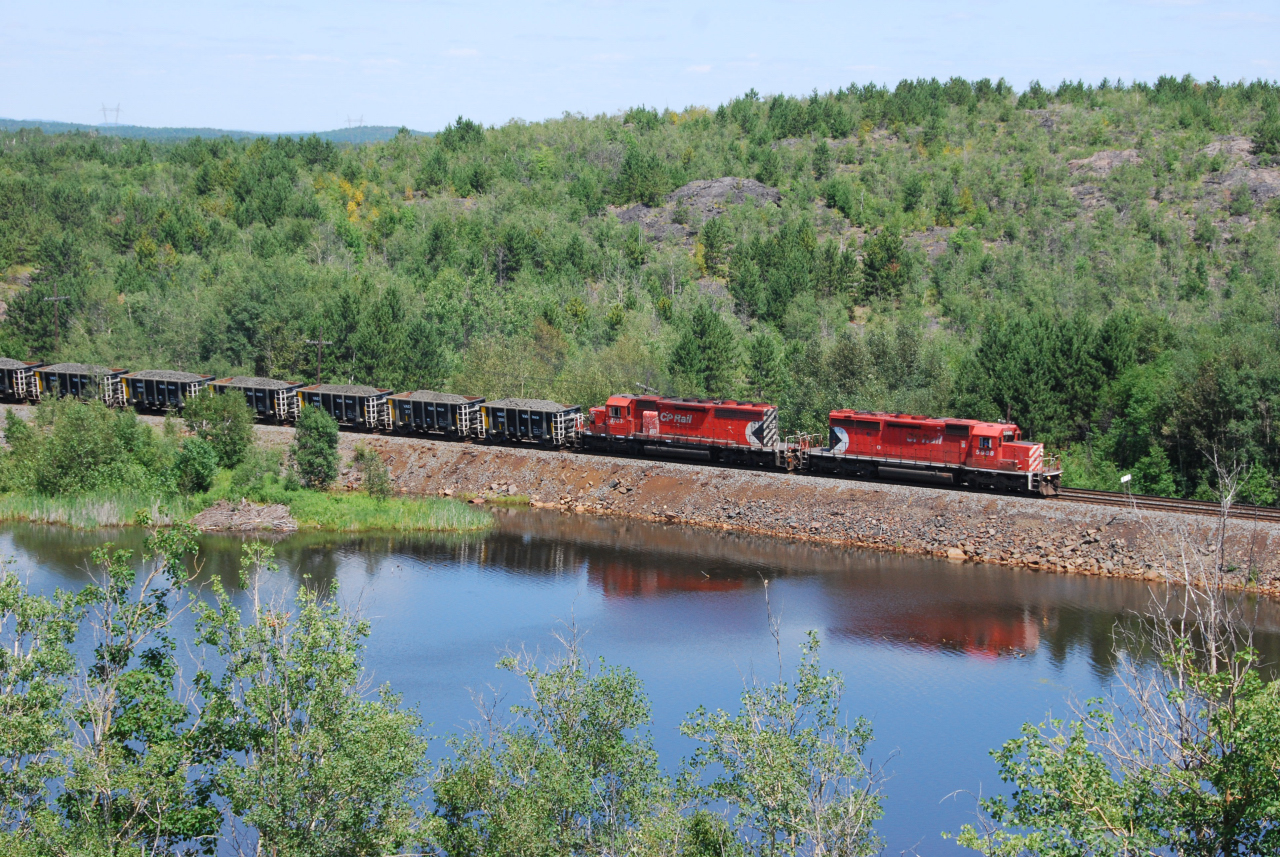 CP ore train U55 completes its turn to Vale's mine at Lavack, ON as it returns to Sudbury with another 40 loads for the smelter at Copper Cliff.