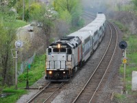 Ex-NJT GP40FH-2 4144 is charging out of Montreal with train 23.  At the next station this unit failed, and the train continued on with only F40PH 330 shoving on the rear.  All of these units were quite tired after long careers and would soon be replaced.