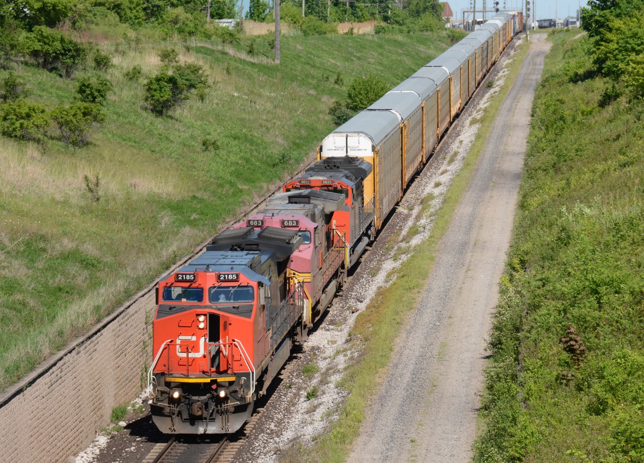 CN train 393 heads for the St. Clair River tunnel with CN2185, BNSF683 and CN8633.