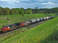 A very ratty looking BNSF 208 trails IC 2726 as they slog up the grade on the York Sub at Beare. They got down to 14mph according to the HBD at mile 7. For those unfamiliar with the location, that's the CP Belleville Sub crossing over the York Sub on the right, and it's about 5 minutes from the main entrance to the Toronto Zoo. 1457hrs.