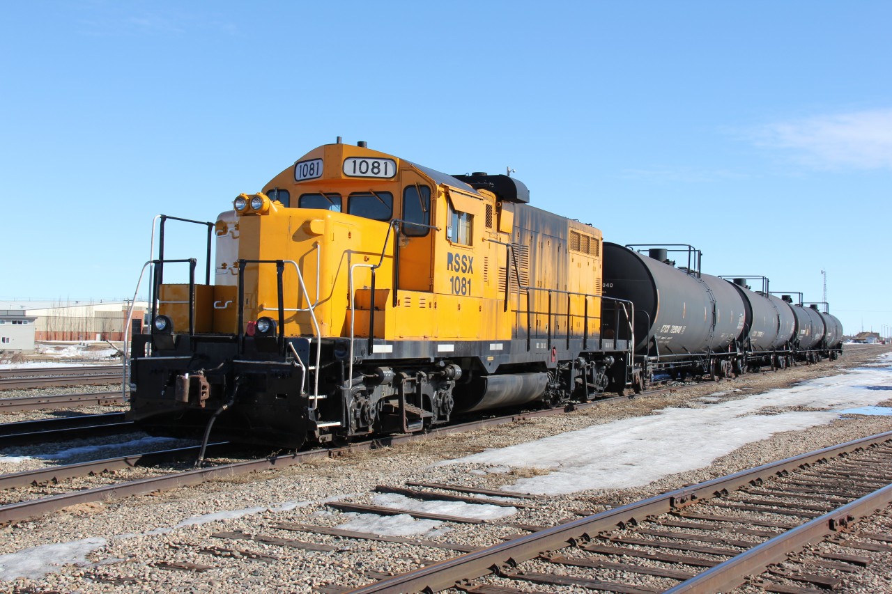 RSSX 1081 was setoff a eastbound freight at Wainwright for a high wheel impact. In this photo the skidded wheels have been changed out with idlers and is waiting for a lift back to Edmonton to have new traction motor / wheel combo's installed.