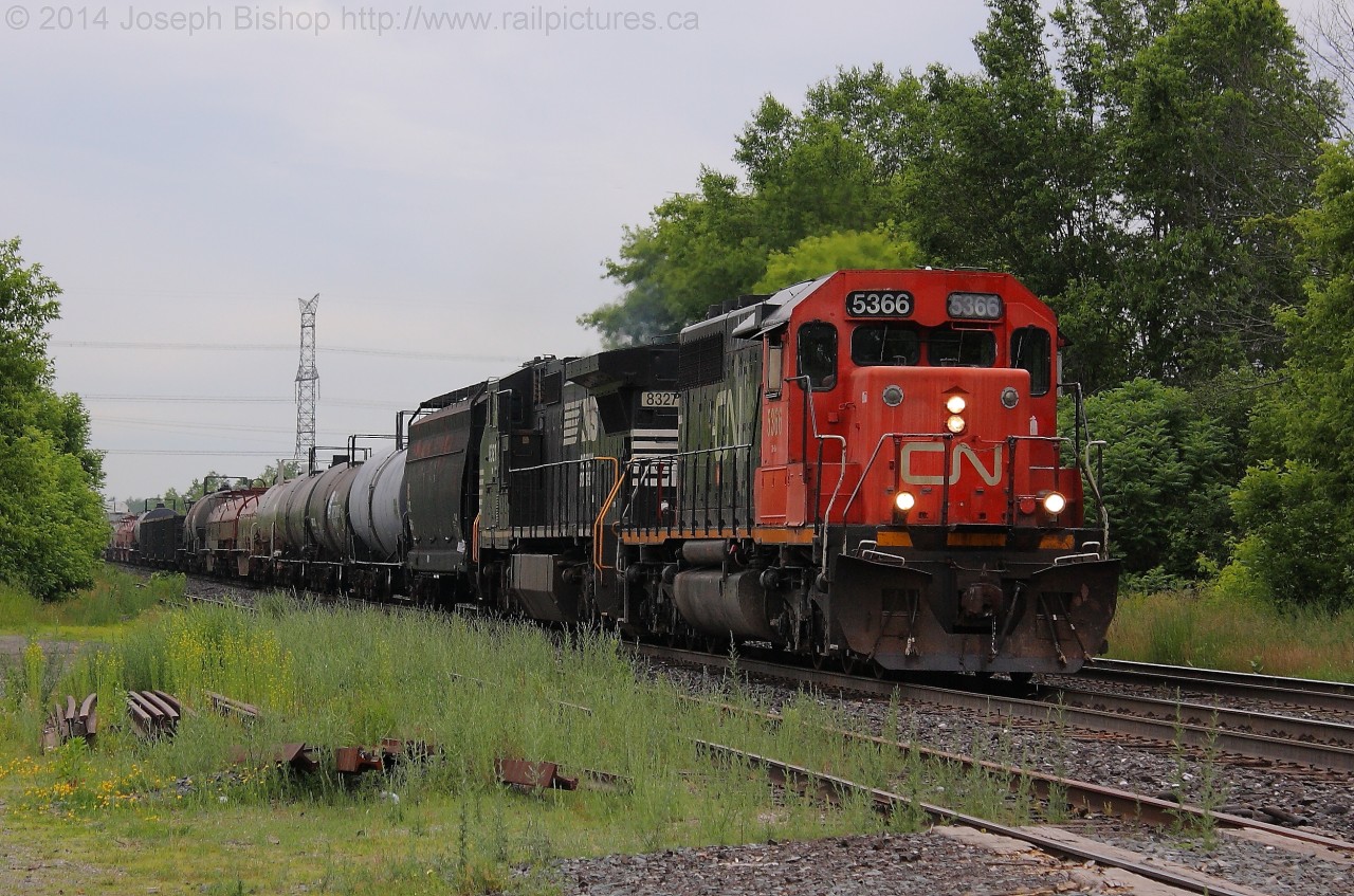 CN 5366 and NS 8327 lead CN 330 through Copetown with a long train.  It was an eventful afternoon after work today.  I found out that CN 435 had stalled and was being pushed up the hill by CN 551.  After shooting 435 I was informed of this train and had to stick around to shoot it as well!