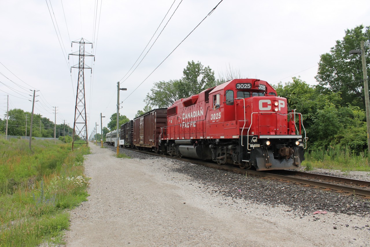 After my I finished my last exam of the school year I went train-watching with a friend of mine to celebrate. When we got to the tracks we saw a train way down the line so we started setting up for it. I definitely wasn't expecting it to be the CP Tech/Geometry Train. I haven't seen it down here for a while so I was pretty happy I got to see it. This was taken at M.P. 109.30 in Windsor, ON.