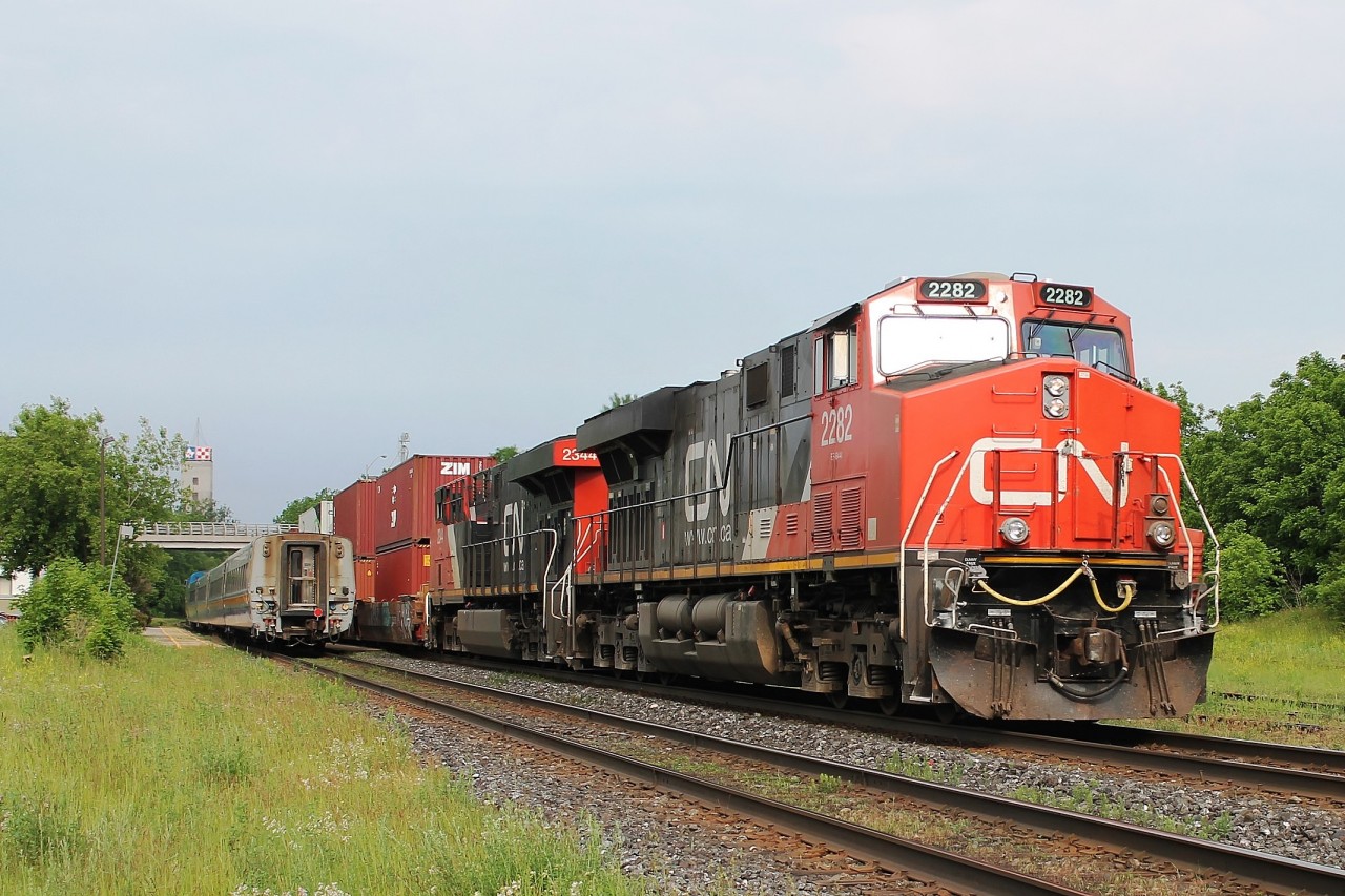 9:14 All intermodal eastbound headed by 2282 and 2344 passes the westbound Via in Woodstock.