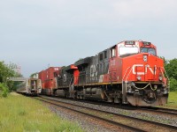 9:14 All intermodal eastbound headed by 2282 and 2344 passes the westbound Via in Woodstock.