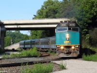 A westbound VIA train quickly diverges from the Oakville to the Dundas subdivision, just about 2 minutes after CN 330 diverged from the Dundas to the Grimsby subdivision. As I hear it coming i quickly pull out my camera and get a decent "around the bend" shot just in time.