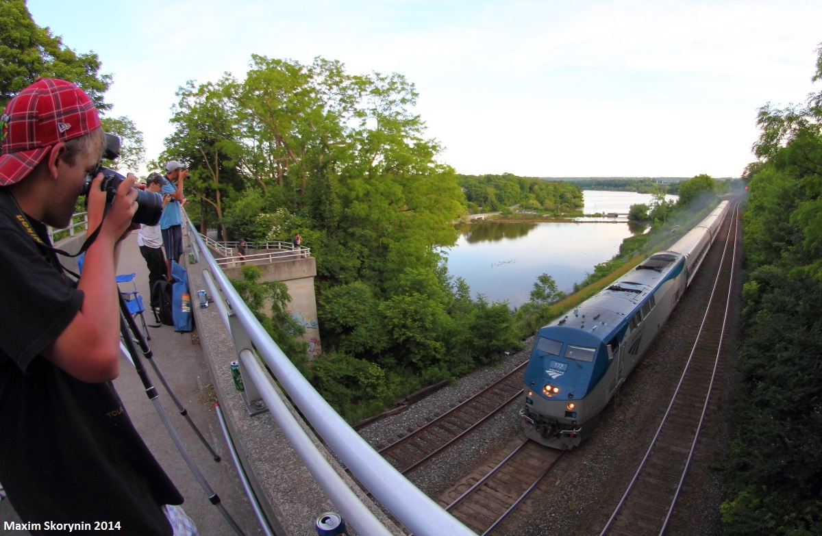 Railfans at the 20th annual Bayview meet up take pictures and video of the evenings Amtrak train. It was about 10 minutes late into Aldershot station.