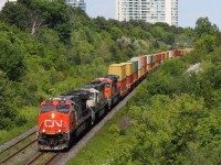 After coming home from this mornings FPON on CN U710 (The next photo is of it) and having a quick lunch, I get another email about 149 going by Wesleyville with 2 BNSF's in trail. I decide to miss it as it will probably work Oshawa for some time, but in about 20 minutes, I get another email that it has passed Liverpool at 13:55. I quickly set out to Hilda to go get it, unfortunately, the sunlight wasn't on my side but nonetheless. This was my first time seeing a "white" BNSF.