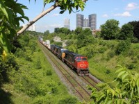 As I finish school this year, I get a timely notification that CN 149 has cleared Whitby on the Kingston subdivision with 2 CSX's trailing. I grab a quick snack and set out and wait a bit, and soon enough 149 comes rolling by! Thanks goes the people for the heads up, you know who you are!