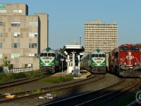 CP Train 255 is passing GO class units #600 and 627 waiting for the Monday morning departure out of the former TH&B Hunter St station.