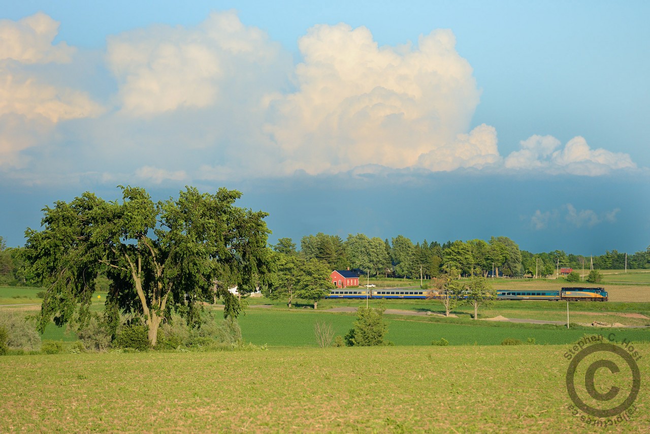 VIA 87 is passing through the countryside found between Guelph and Kitchener, while a storm is over lake Ontario gathering steam for western New York.