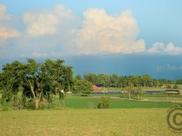 VIA 87 is passing through the countryside found between Guelph and Kitchener, while a storm is over lake Ontario gathering steam for western New York.