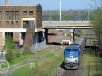 Construction is well under way on the other side of the bridge to finish GO James St. North in time for the Pan-Am Games in summer 2015. The former CN Station at left, built in the 30's and now owned by LIUNA  serves as a banquet hall. The last GO train that called from the former CN station was in 1996. 18 years later, instead of re-using the existing station, GO is spending $30M on a new structure, parking, platforms, and if rumours are to be believed, sound barriers (especially along Stuart St). GO is also building a layover facility at Lewis Rd. in Winona, but the Centennial station is not yet on the books. I would anticipate this new station will serve a temporary layover facility for GO trains until Lewis Rd. is completed in 2015 or 2016, but that's just my guess.