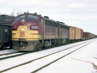 With white extra flags flapping, SOO Line FP7 2224A and a B-unit head west at Guelph Junction with freight in tow, over CP's Galt Subdivision in February of 1964.
