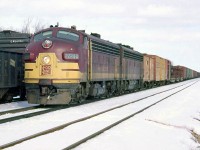 With white extra flags flapping, SOO Line FP7 2224A and a B-unit head west at Guelph Junction with freight in tow, over CP's Galt Subdivision in February of 1964.
