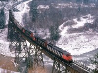 CN 5441 east at Ainslie Creek Bridge just west of Boston Bar, BC in January, 1990.