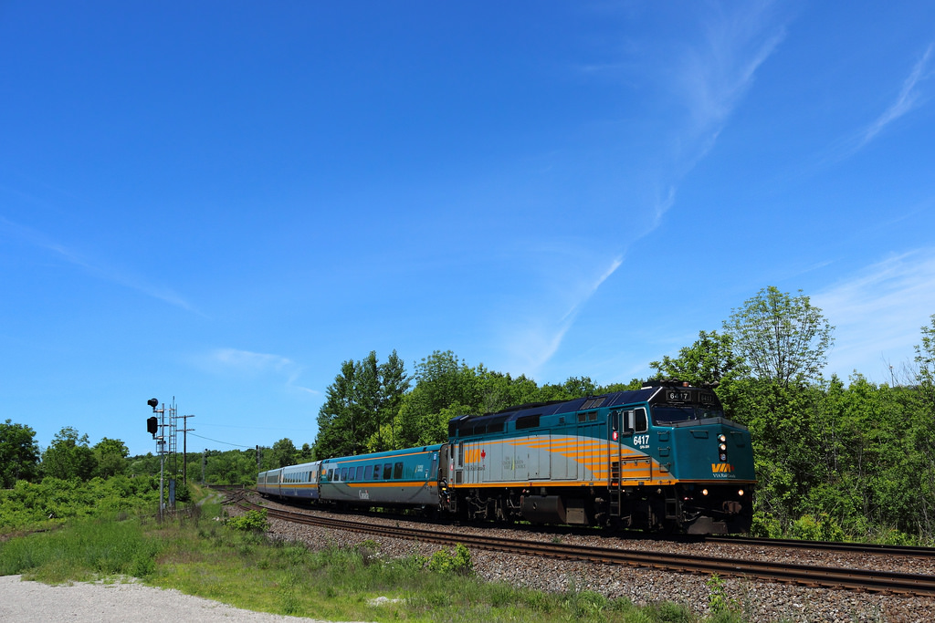 While I was planning to spend the whole day at the Laking Gardens footbridge for the annual junction meet, the move to the cowpath was required for better lighting conditions. Not long after our arrival, both CN 149 and VIA 72 roll by within minutes of eachother making for some nice shots. This was actually my first time shooting at the cowpath, and it definitely won't be my last.