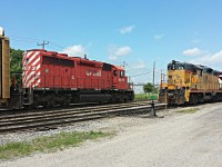 Old meets older with this very rare encounter of an SD40-2 leading a long string of autoracks past the parked OSR power. Thanks dad for bringing me out. :) 