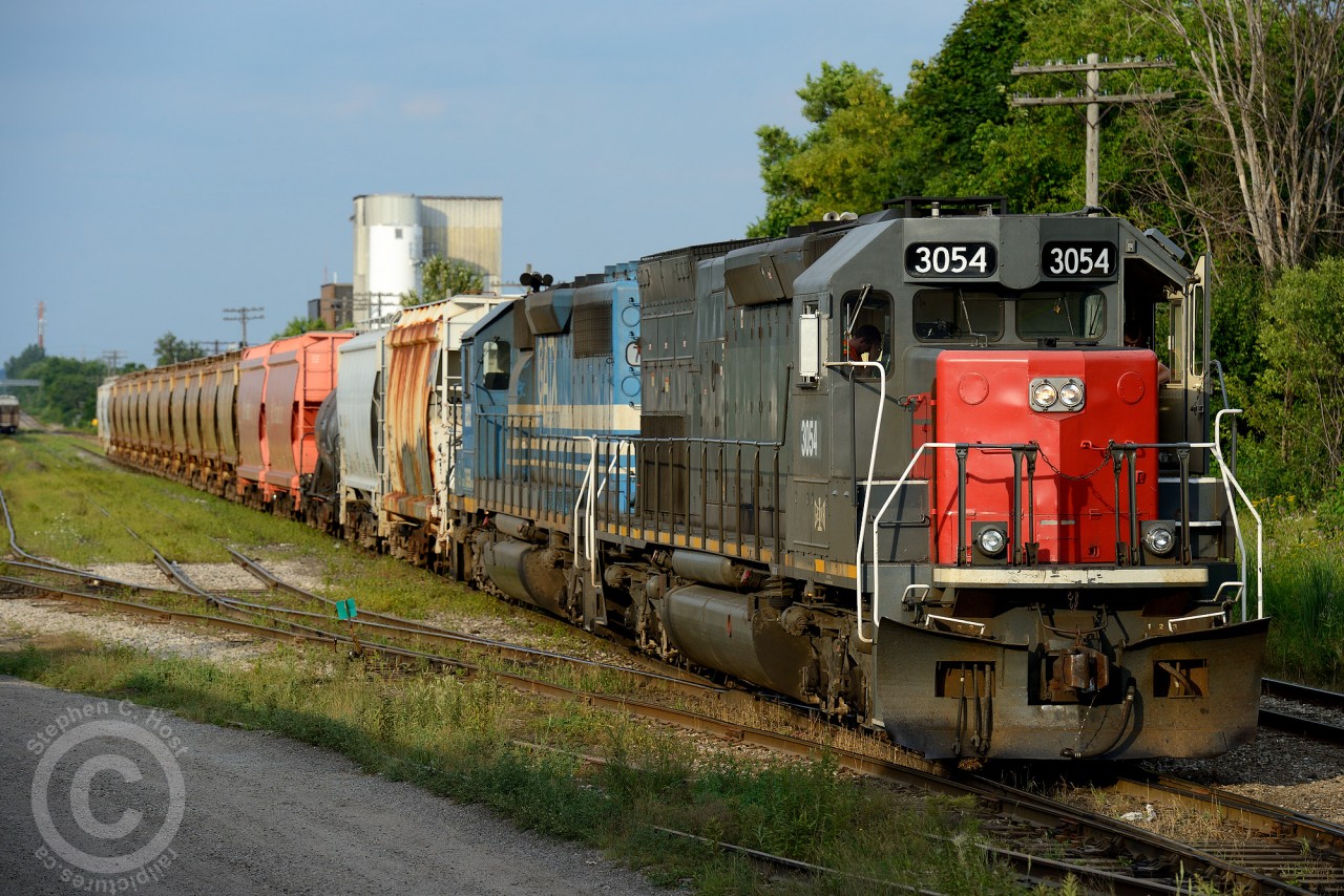 Crew from #433 has taken over 431 at Kitchener is in the yard waiting for VIA 87 and GO 211 to pass before heading west to Stratford. Once arriving at Stratford, it is likely they will yard the train and grab west interchange cars for the overnight run to London and back (to Stratford).

Leading the charge is recently re-numbered 3054 - ex GEXR 9392, ex CEFX 9392 ex SP 9392. A paint job can't be that far off, can it?