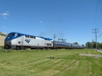 
The 694 passed slowly , the curve in the downtown of st-Jean , on way to New York city !