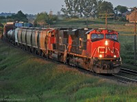 CN 2271 and 5747 roll 369's rather late train through the S-curve at Newtonville with minutes left before the sun dips below the horizon. 2030hrs.