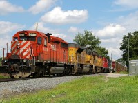 147 arriving at Wolverton behind a colorful consist of CP 5926 - UP 8348 - UP 5517 - CP 4414 - CEFX 1059 - CP 8559