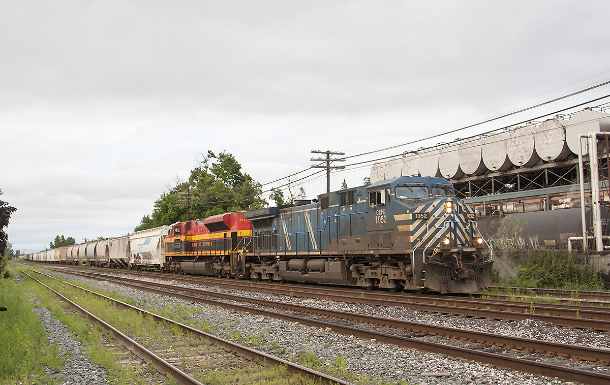 As storm cloud pass through Toronto CEFX 1052, KCS 4113 lead today's 241.