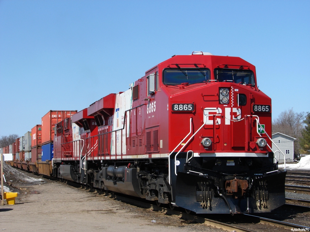 CP 8865 South starts to pull at Station Name Sign MacTier enroute to Vaughan with 102's freight. CP 8865 and 8863 seen here working together in the short lived "Olympic Scheme" (celebrating CP's sponsorship of the Vancouver 2010 winter games) hadn't been on the property for long, and certainly look great here for already having a couple trips across the country under their belts!