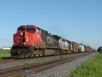 CN 2572 and WC 6939 highball out of Brechin East handling train 451 to North Bay, with 5 cars for Huntsville on the head end. 