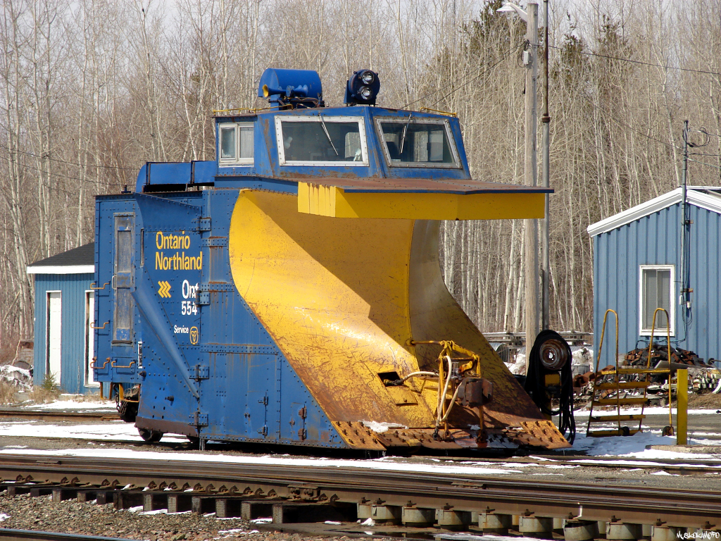 After a couple weeks of plowing across ONR's system almost non-stop, spring has finally sprung in Northern Ontario and plow 554 finds itself back at the summer home in Englehart. Spotted shy of the fuel racks, it will eventually be moved to it's usual nest behind the shop building inside the wye.