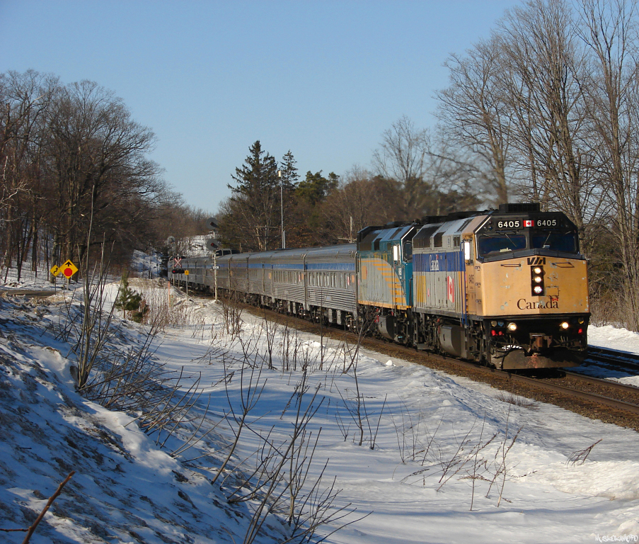 VIA #2 - VIA 6405 South seen several hours late highballing through Dock Siding trying to make up some lost time racing down 130 more miles to Union Station. This would be one of the last times I shot an original 6400 in gray/yellow paint before they were all rebuilt. I am definitely a bigger fan of this look compared to the rebuilt look that 6458 is sporting behind 6405!
