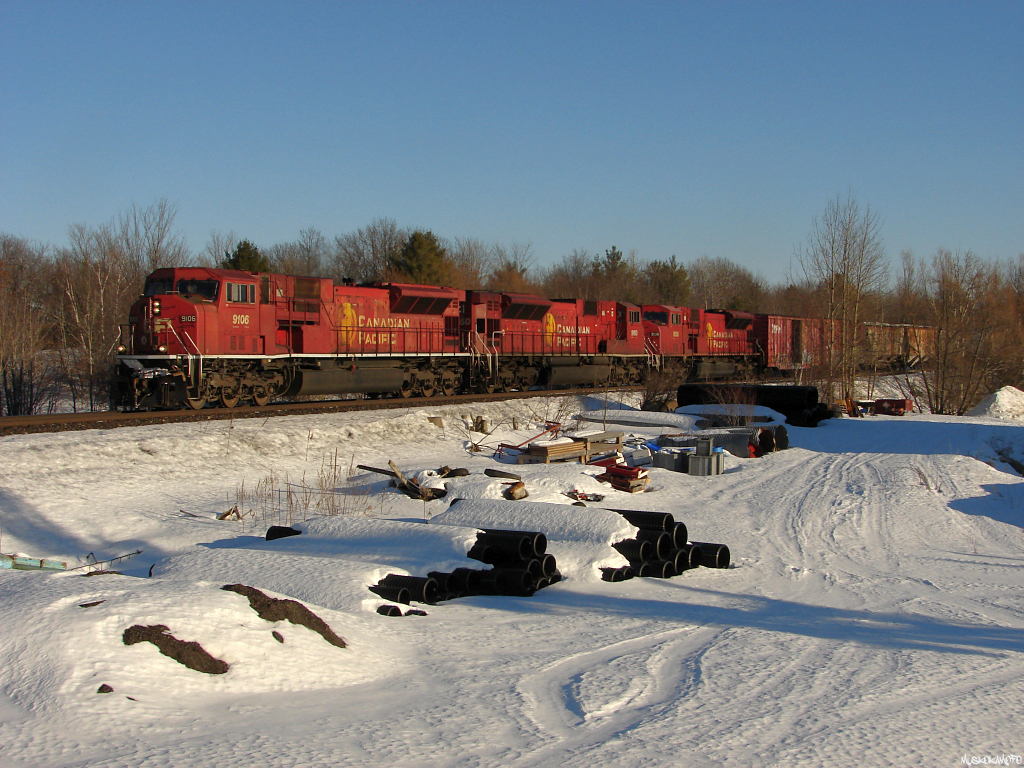 CP 9106 North with 223-22's freight departing MacTier with a trio of 9100's. Before they were mothballed, CP's SD9043MAC's provided a fresh, modern EMD look in an otherwise drowning pool of GE AC4400CW's and ES44AC's mostly seen in the Winnipeg-Toronto corridor during their prime. Today's 223 has CP 9106, CP 9160, CP 9136 and a short 46 car train, highball!