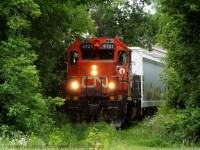 <b>Welcome To The Jungle</b> <br><br> CN L58031-09 slowly trundles towards Ingenia through the jungle of trees by the Cayuga Street crossing.