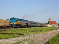 Via 83 accelerates out of Brantford on a nice summer evening. 