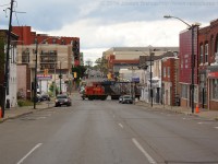 CN 580 breaks the silence in downtown Brantford as CN 4721 blows for Colborne Street on its way to Ingenia.