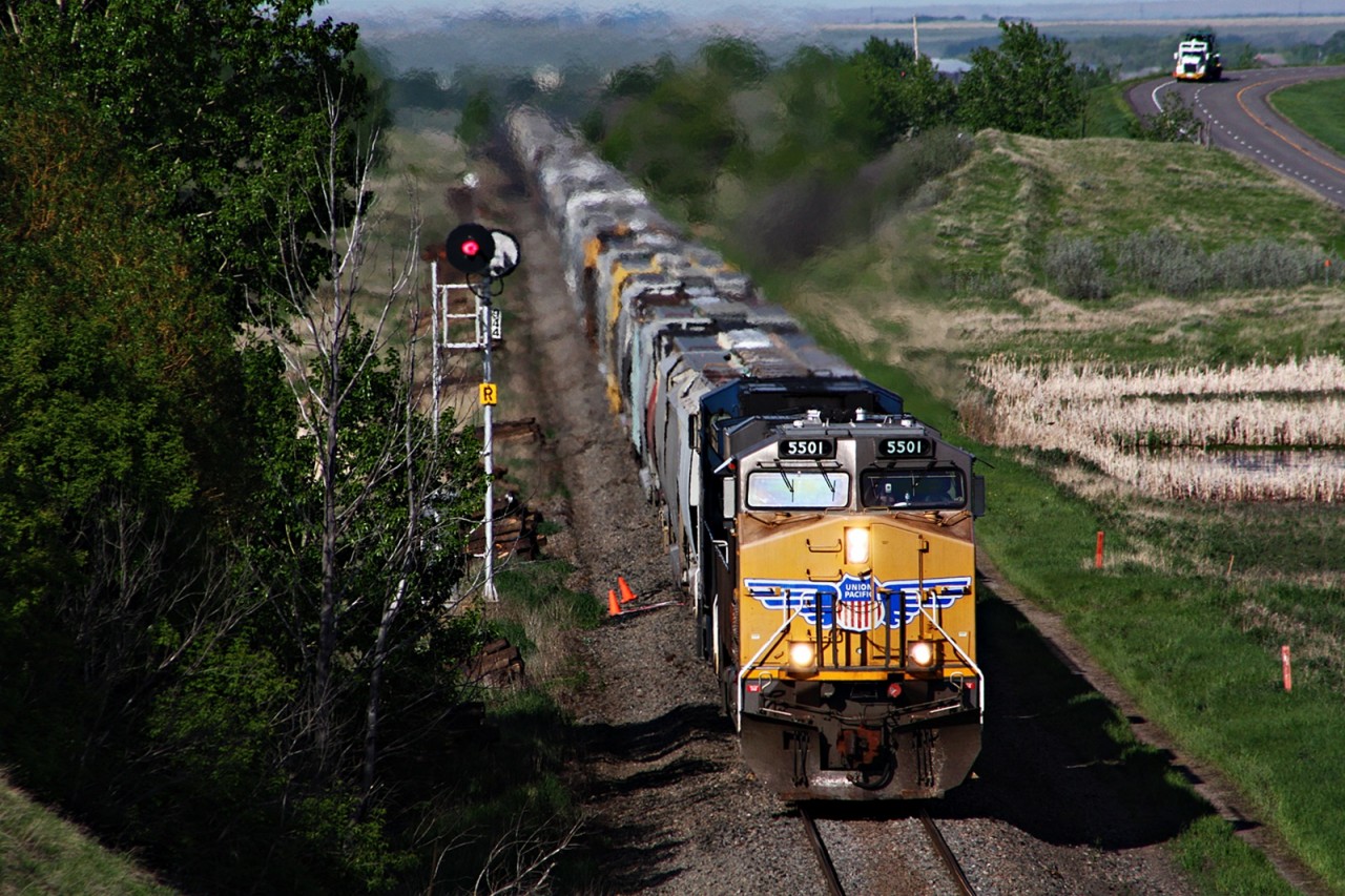 UP 5501 leads a grain train on the CP Swift Current Subdivision towards Swift Current Sask.