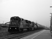With a light mist coming off of Lake Ontario, CN 330 heads east with CN 2022 and 8903. 