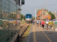 The GO excursion trains are in full swing to Niagara, and with their frequency, Grimsby Sub meets are pretty common. This is not how you would expect it to be, however. The Amtrak Maple Leaf from New York has notoriously been late for years, and when the GO excursion trains started back in 2009, the GO would regularly have to wait at Clifton for up to an hour so the Maple Leaf could clear the block from Niagara Falls station. By the time the GO would need to use the platform, Via 95 from Toronto would be sitting at Clifton too. GO eventually decided to extend the platform west, as it was clear the Maple Leaf wasn't going to start being on time. While Via 95 no longer runs, the extended platform sure comes in handy. On Canada Day, GO 787 pulled into Niagara Falls, and the Maple Leaf arrived about 15 minutes later, and the Amtrak crew made sure GO was aware of that. It would be a good 10 minutes before the GO and Amtrak crew, as well as the RTC sorted everything out and the Maple Leaf was allowed to enter GO 788's block. Judging by the radio communication, this was a mess for the crews and the RTC, and the GO crew was particularly concerned about having to get out of the way for the Maple Leaf once it departed. Thankfully the Maple Leaf was late enough, along with a good hour of customs inspections, that this didn't need to happen. However, just like last summer, and the summer before, this particular turf war will become the norm until Labour Day. As for the railfans, it was a good way to spend Canada Day.