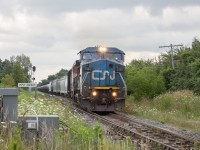 It's not very often that I pray for overcast lighting, however I'd greatly prefer that over a backlit shot, especially considering the fact that its rare opportunity to catch a freight on the Grimsby Sub that isn't backlit or too dark. In this scenario, it helped that a Blue Devil was in the lead, which fits the scene well, and to top it off is BCOL 4608 trailing as it grinds through the control point at Jordan. 331 had just cleared a 25mph restriction between Mile 14 and 15 due to Monday's washout, however it was back at 45mph by the time it hit Jordan with 8400 horses and only 42 cars in tow.