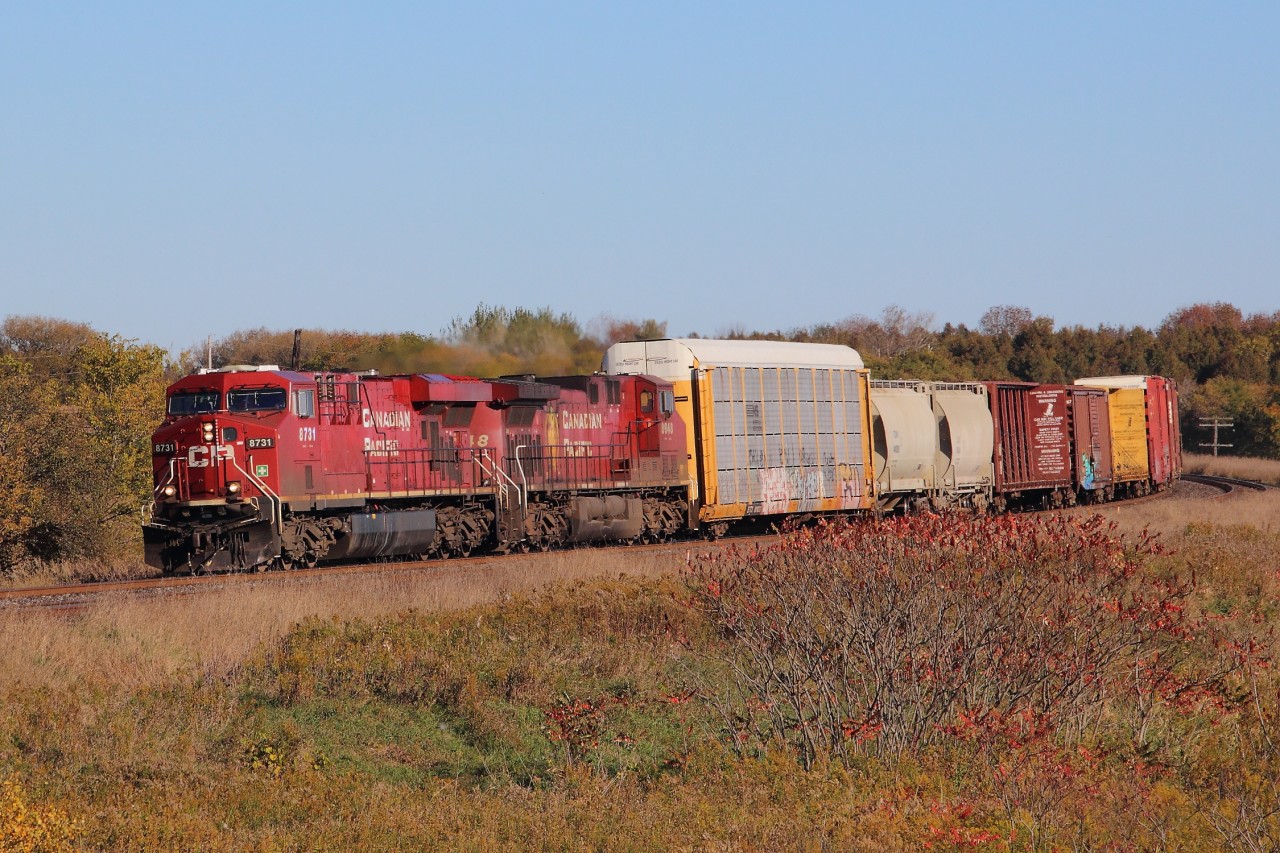 CP 8731 and 8648 head west at Lovekin on Thanksgiving weekend.
