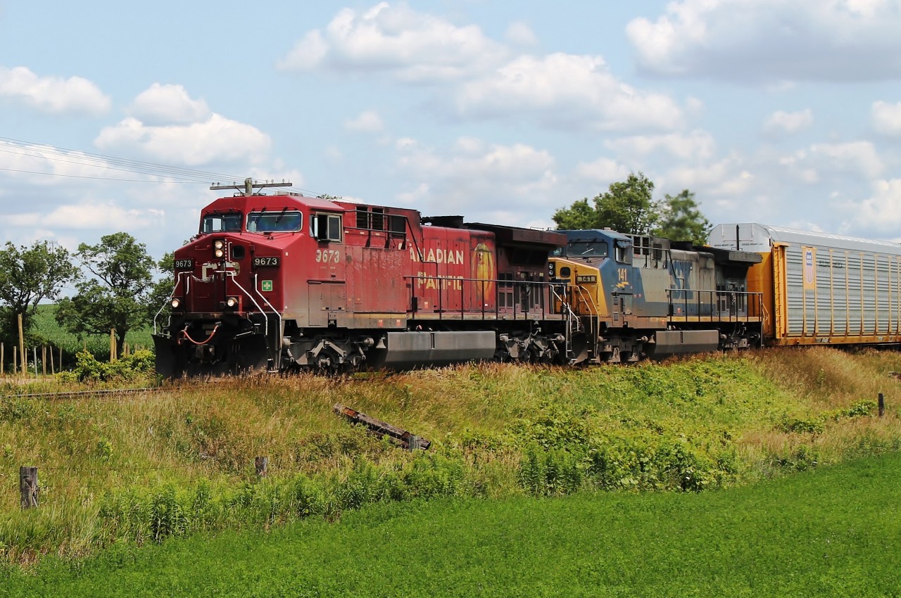 Whilst in Princeton waiting for 331 I heard on the scanner that CP9673 was seeking permission to travel west from Wolverton. I travelled the 10km to the west of Drumbo at Gobles Rd crossing in time to meet the train of all autoracks. It was well worth the trip when I saw the second unit was CSX 141. I still got back in time to catch 331 and another west bound freight.