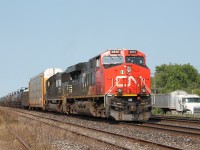 Having arrived later than normal I was surprised to see 2815 stopped on the yard. One of the other photographers there, told me they were having trouble with the trailing unit-NS SD60 6707. After a west bound passed on the north track the train headed east rapidly picking up speed on the south track!