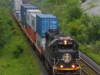 A one of a kind class leader for train 112... IC 1000 leads CN 112 around the corner and almost at its destination at Brampton Intermodal Terminal on its long, several day journey from British Columbia. At the end is CN 2309 shoving, so 1000 isn't doing all the work by itself.