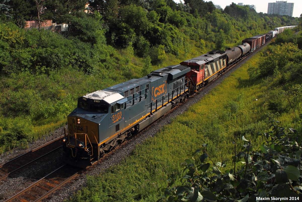 After getting a timely heads up from Railpictures.ca contributor Michael Delic, that CN 373 has finished working Oshawa yard and is on the move, I immediately packed up and headed trackside. As I got there, this train was already lined, and about 20 minutes later it showed up. This is a very rare occurrence to have FPON lead on CN in Ontario as locomotives from the USA don't have a refrigerator and a stove that CN units have, so now they always slap a CN unit in the lead if they can. The morning light made this train impossible to shoot in perfect light so I guess I can take what I have.