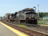 NS 7598 and NS 8393 a C-40-8w pulling a convoy of mix cars 