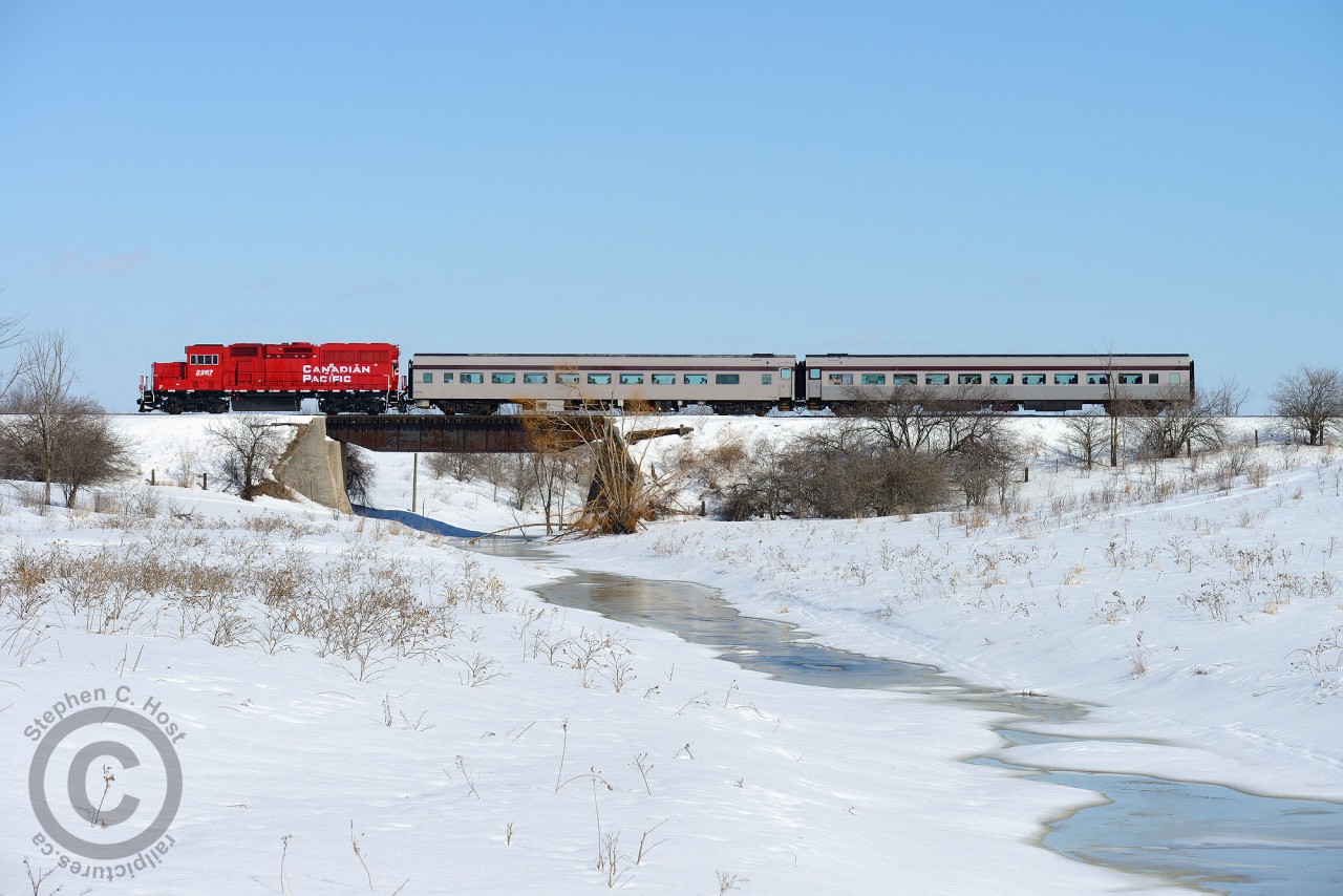 Since others have posted cooler, winter-era photos - I thought that I could throw up one with the white stuff. Here we see CPR's passenger train to Orangeville - service never ended in 1970 - hauling a pair of coaches through Snelgrove, Orangeville, and eventually, Owen Sound. 
Right... passenger service did end in 1970. So what is this? Here we have the OBRY "snow train", complete with classic painted coaches, and CPR 2267, assigned temporarily to the OBRY as their regular engine, CCGX 4009 was out of service for mechanical issues. The brand new GP20C-ECO had the pleasure of hauling the last "snow train" of the season, passengers on board none the wiser that the newest in the CPR fleet was at the lead. I bet the crew enjoyed the in-cab amenities (Picture