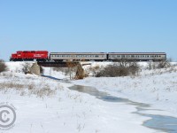 Since others have posted cooler, winter-era photos - I thought that I could throw up one with the white stuff. Here we see CPR's passenger train to Orangeville - service never ended in 1970 - hauling a pair of coaches through Snelgrove, Orangeville, and eventually, Owen Sound. <br><br>Right... passenger service did end in 1970. So what is this? Here we have the OBRY "snow train", complete with classic painted coaches, and CPR 2267, assigned temporarily to the OBRY as their regular engine, CCGX 4009 was out of service for mechanical issues. The brand new GP20C-ECO had the pleasure of hauling the last "snow train" of the season, passengers on board none the wiser that the newest in the CPR fleet was at the lead. I bet the crew enjoyed the in-cab amenities (Picture <a href=http://www.railpictures.ca/?attachment_id=13816" target=_blank>here</a>) plus that 'new cab smell'. One has to wonder if this was planned - considering the paint scheme of the CVE coaches - a classy paint job made all the better by pure circumstance!<br><br>Any RP.CA photographers have classic Owen Sound/Teeswater/Elmira branchline photos they wish to share? :) :) :)