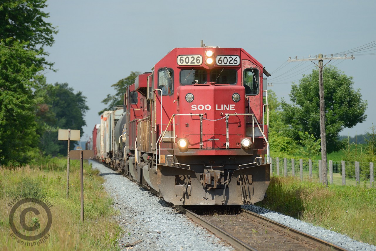 At Ayr Mileboard, 240-24 is pulling slowly out of Wolverton after lifting 30 from the yard. A byproduct of the Hunter Harrison/Bill Ackman era at CP was cancellation of the SD60 rebuild program - allowing us the chance to be shooting images like this in 2014.. if one is lucky enough.